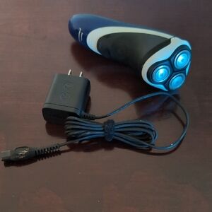 Phillips Norelco Cordless Electric Shaver with charger cord - Black and Blue